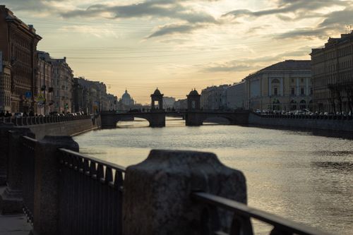 Free Peaceful sunset view of Fontanka River and iconic architecture in Saint Petersburg, Russia. Stock Photo