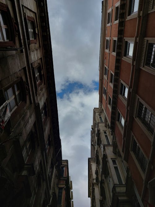 Buildings under a Cloudy Sky