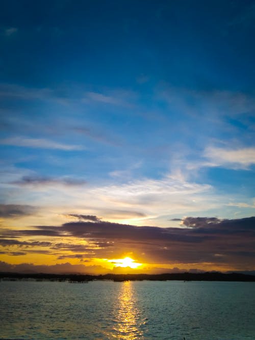 Foto d'estoc gratuïta de mar, posta de sol a la platja