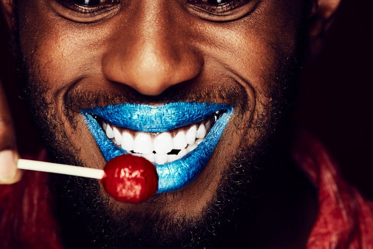 Smiling Man With A Lollipop 