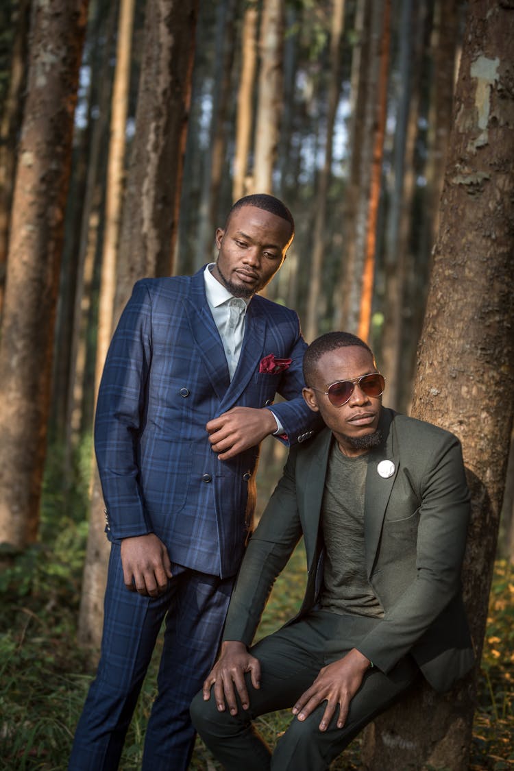 Men In Suits In Forest