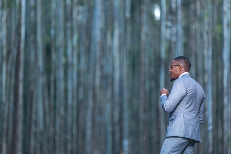 Man In Suit On Blur Background