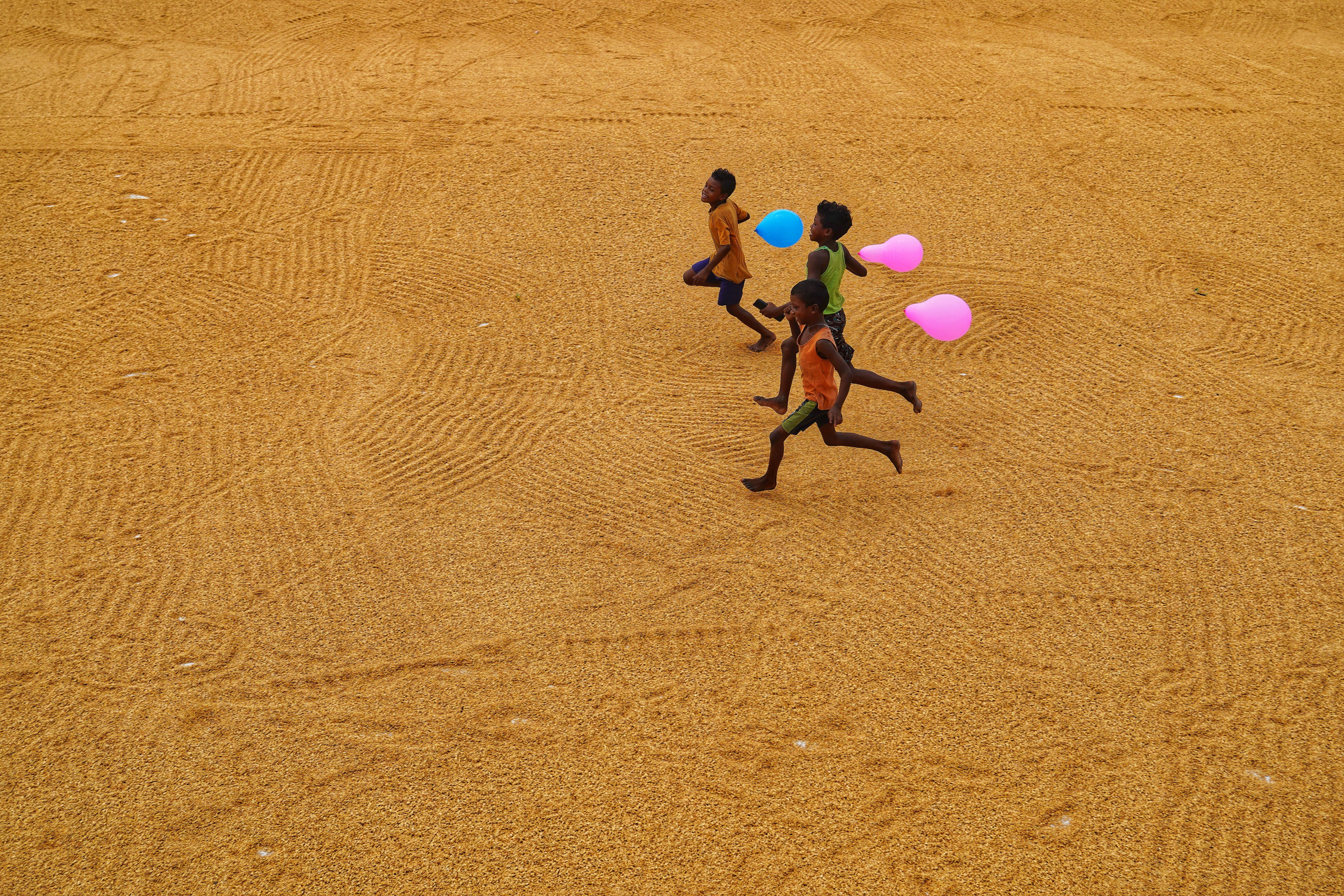 Kids Running with Balloons · Free Stock Photo