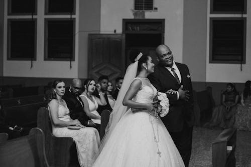 Grayscale Photo of Bride and Groom