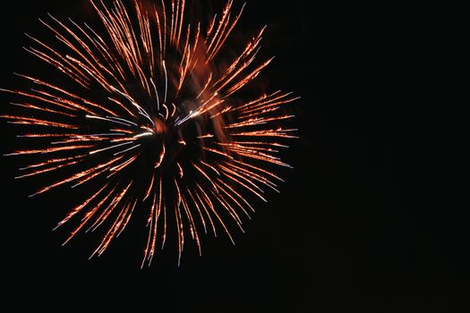 Vibrant fireworks burst against the night sky in Conway, Arkansas.
