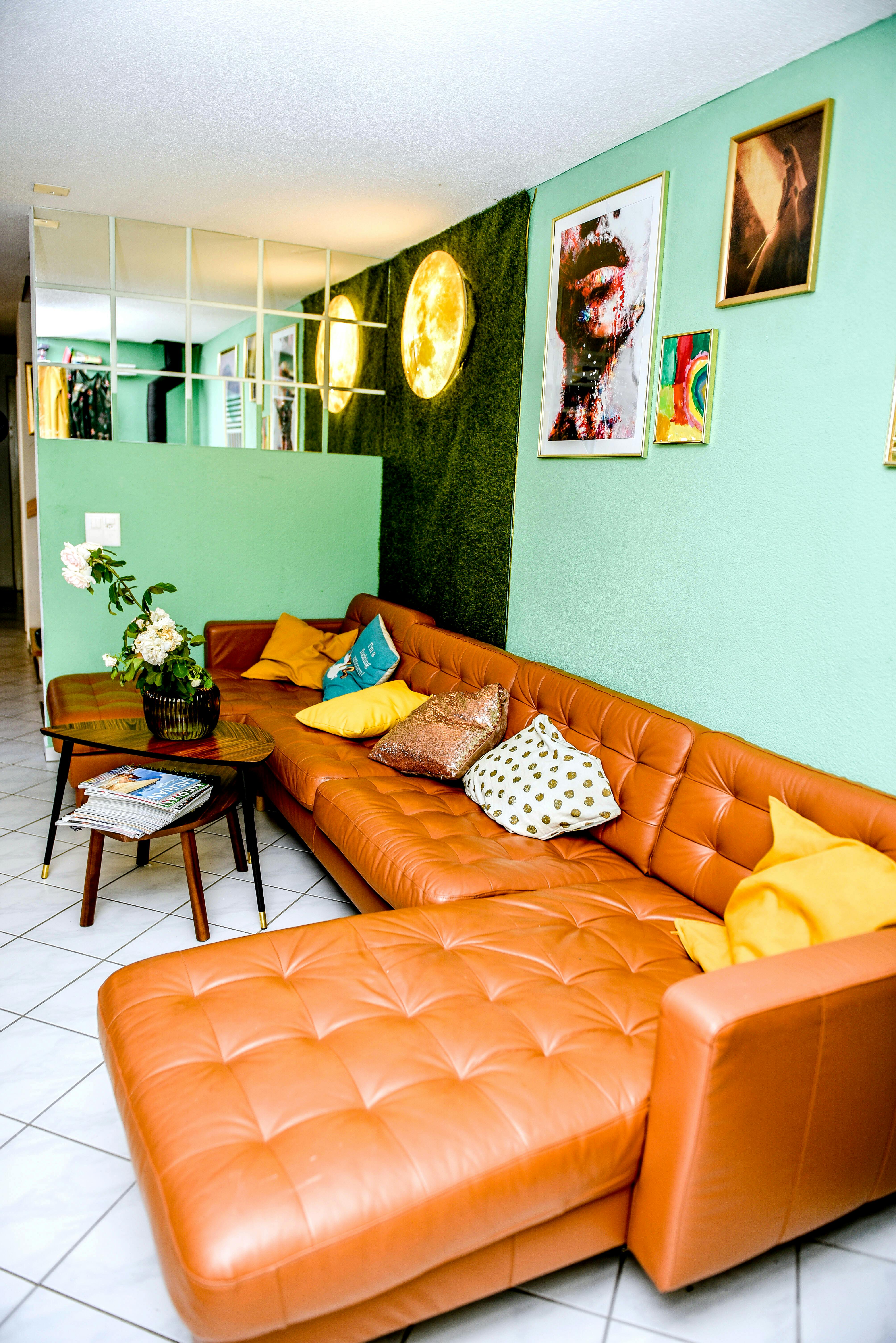 Throw Pillows on Brown Leather Couch · Free Stock Photo