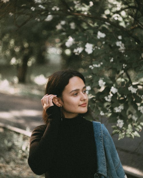 A Portrait of a Woman in a Black Turtleneck Sweater