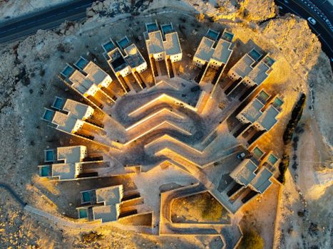 Stunning aerial view of unique desert architecture in Mitzpe Ramon, Israel.