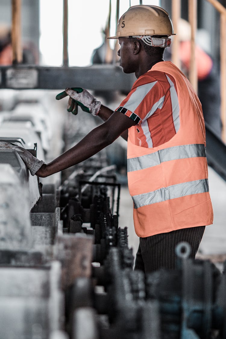 A Construction Worker With A Safety Helmet