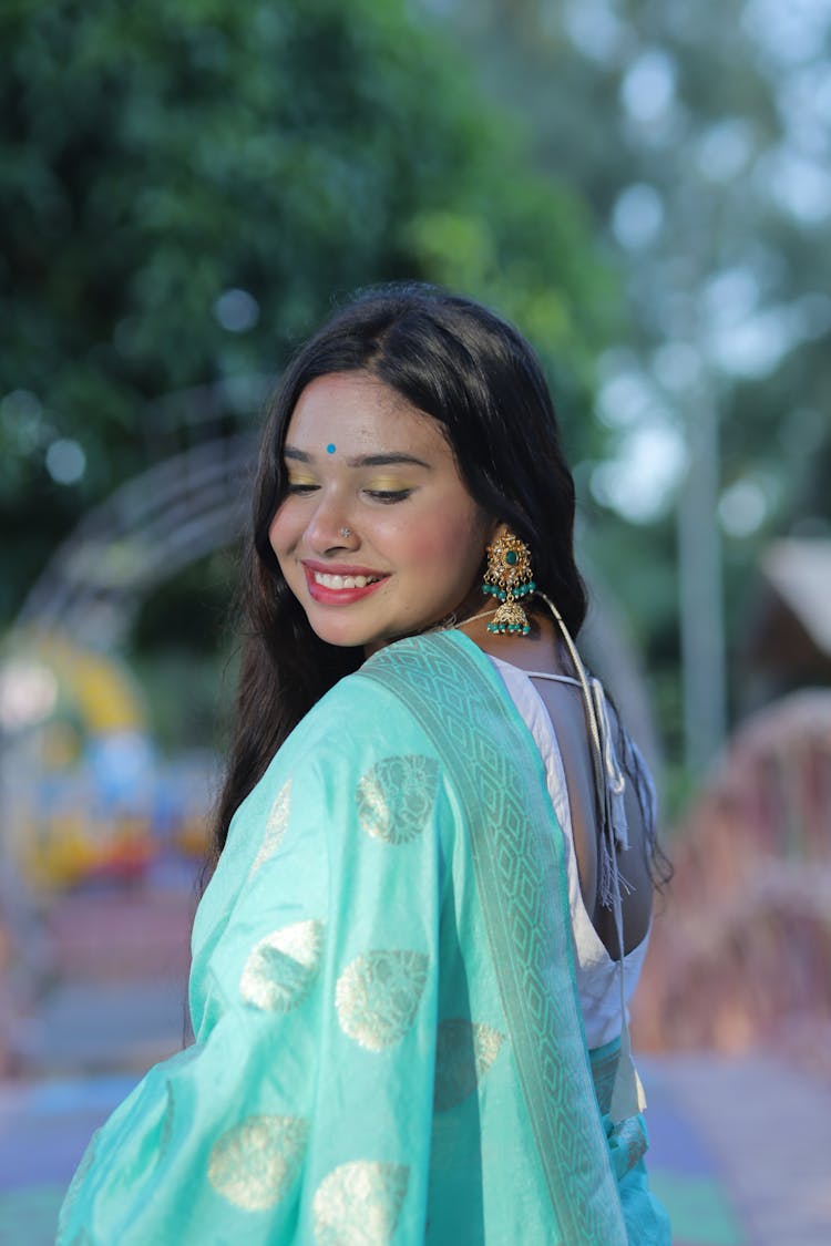 Beautiful Woman Wearing A Green Shawl