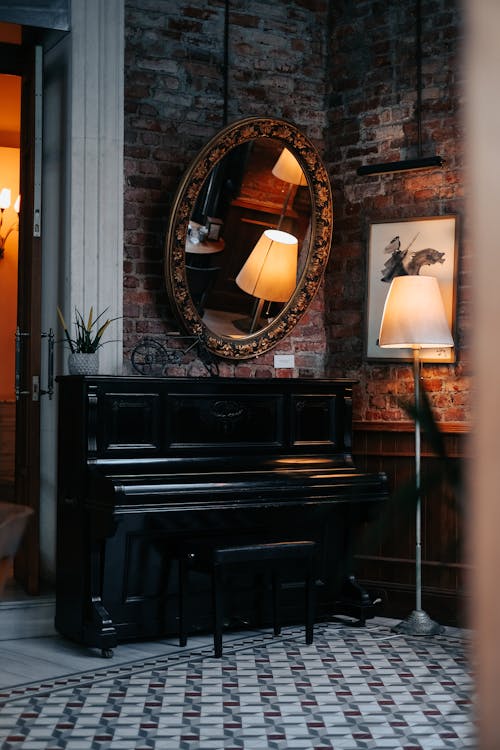 Mirror Hanging above a Piano 