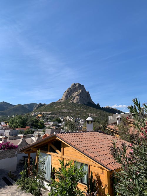 Wooden Cabins with the View on the Bernal Peak in Bernal, Mexico 