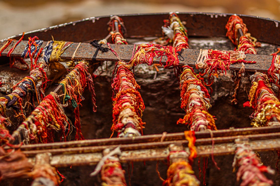 Colorful Thread Wrapped Around Iron Rods · Free Stock Photo