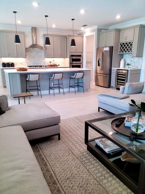 Free Elegant open-plan kitchen and living area with contemporary design and decor. Stock Photo