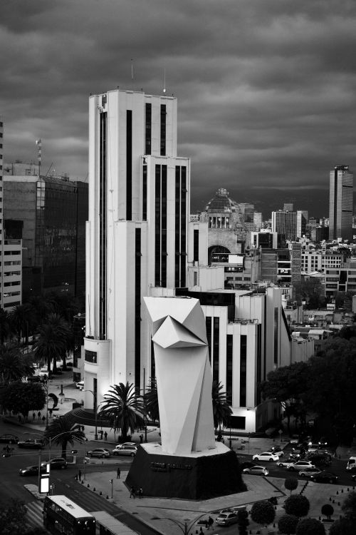 Free Monochromatic aerial view of Mexico City featuring skyscrapers and modern architecture. Stock Photo