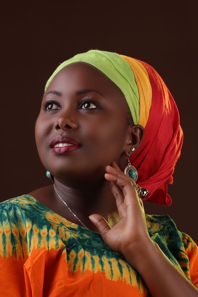 Portrait Of A Young Woman Wearing A Colorful Shirt And Turban 