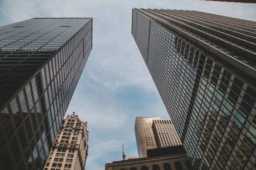 Free High-rise buildings forming a captivating urban skyline under a clear blue sky. Stock Photo