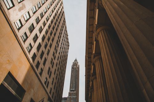 Free Street-level view of iconic skyscrapers and classic architecture in New York City. Stock Photo