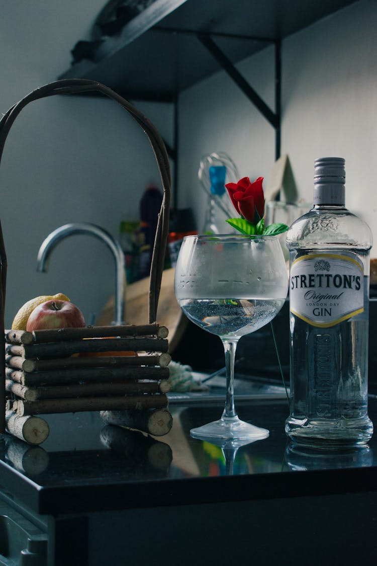 Vodka In Glass On Counter In Kitchen