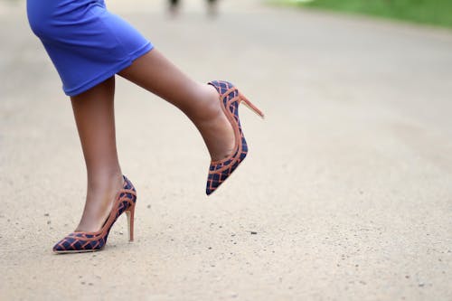 A Woman Wearing Patterned Shoes
