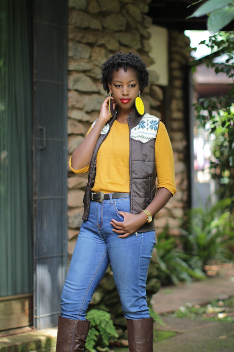 Woman In Jeans And A Vest 