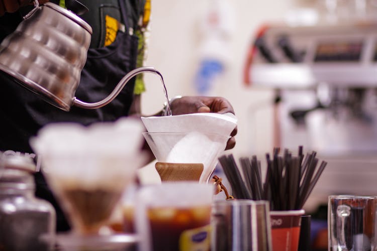 Barista Pouring Water