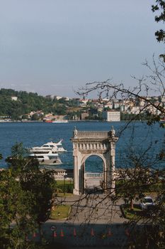 White Concrete Arch Near Body of Water