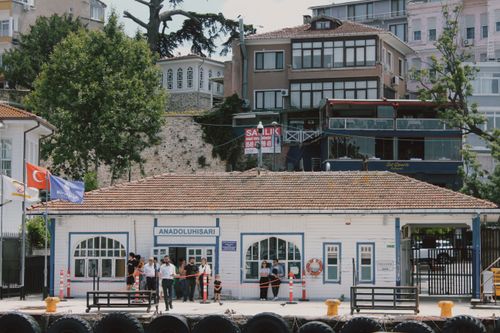 Free A vibrant scene at Anadoluhisarı Ferry Station in Istanbul, depicting urban life and travel. Stock Photo