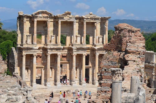 People Standing Outside the Historic Library of Celsus in Turkey