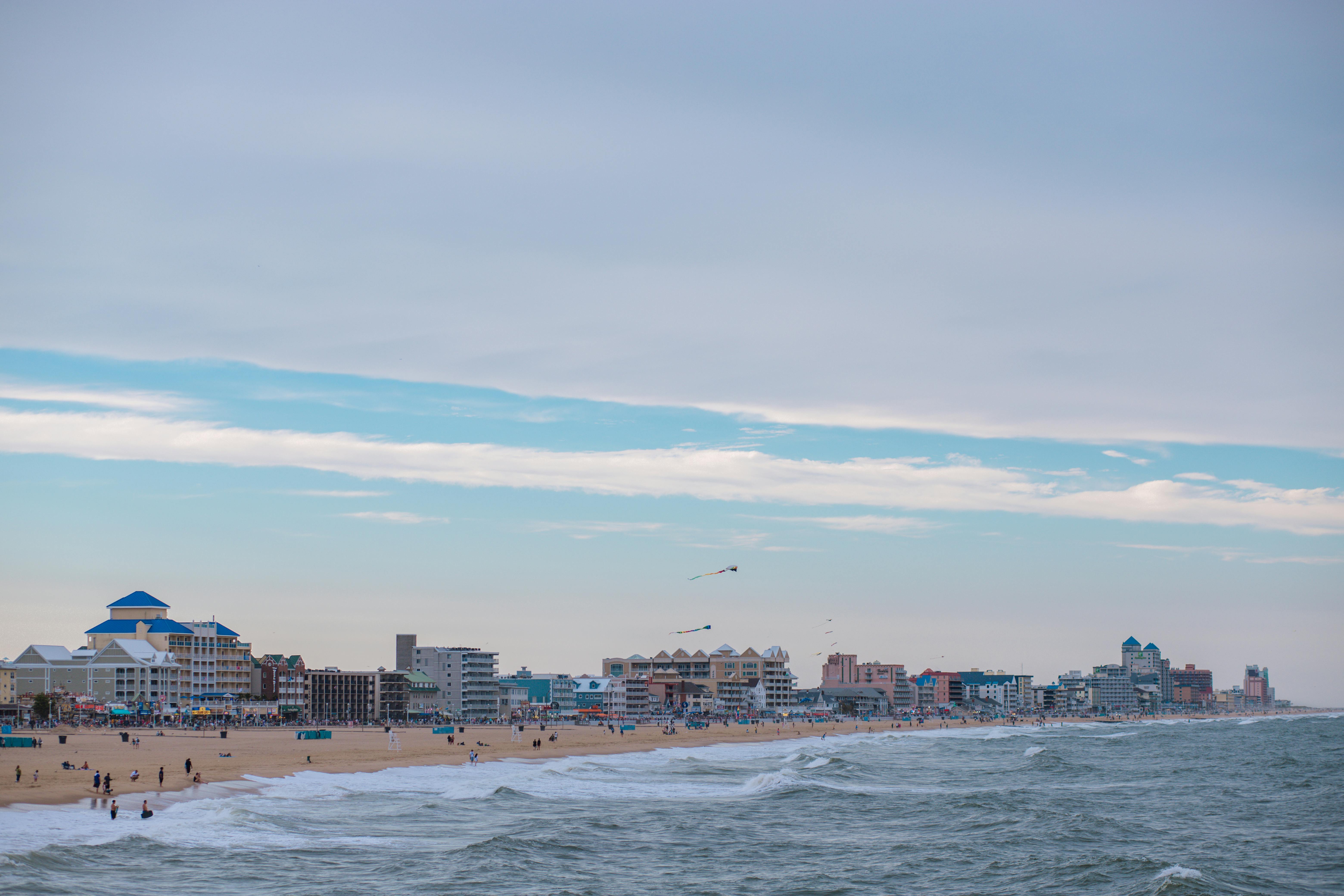 clouds over beach in city