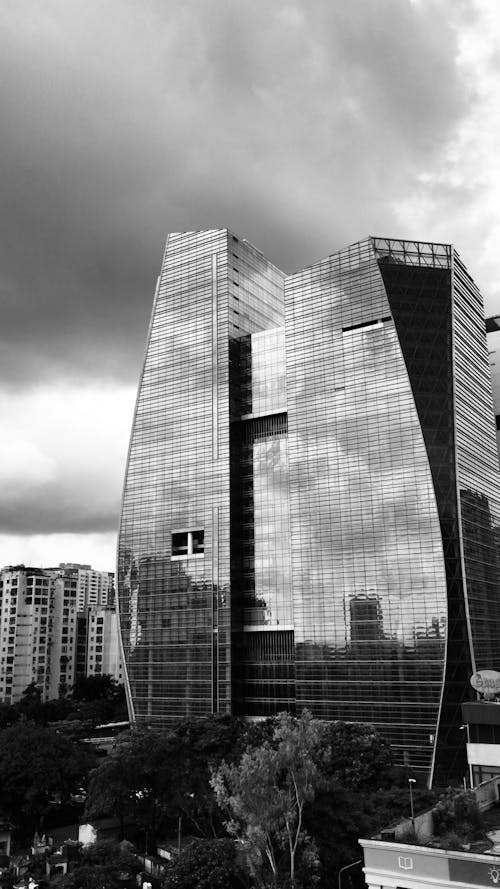 Free Black and White Photo of a Glass Building Stock Photo