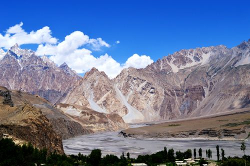 Free Breathtaking view of rugged mountains and river in Hunza Nagar under clear blue skies. Stock Photo