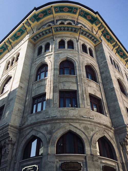 Free Low-angle view of an ornate historic building facade with intricate designs. Stock Photo