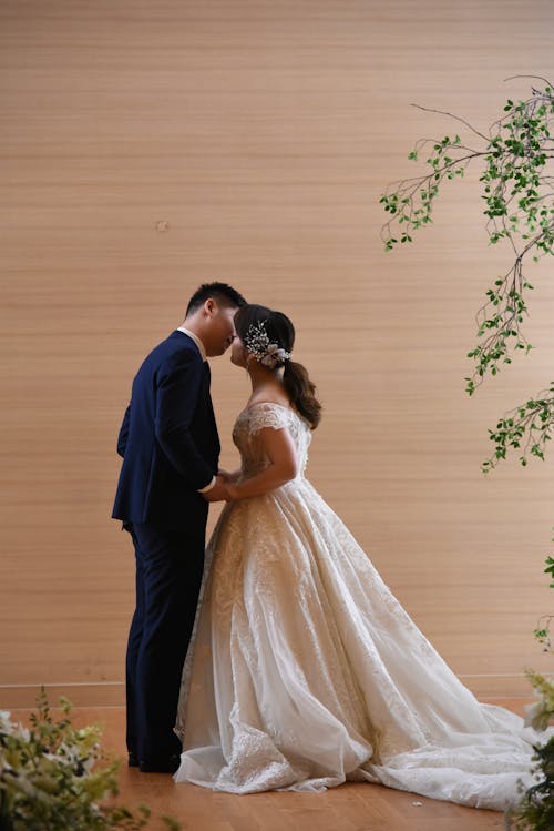 Portrait of a Bride and a Groom Kissing