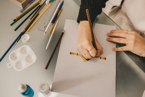 A Hand Coloring the Bond Paper