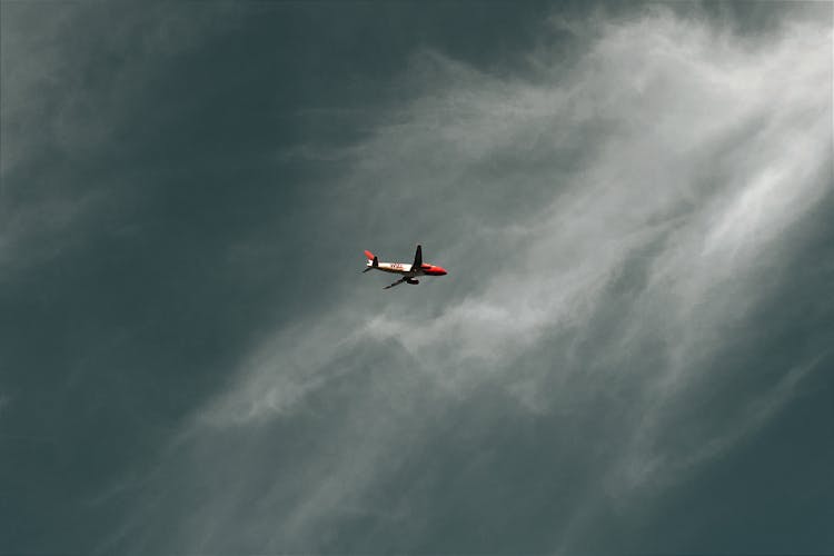 Flying Airplane In The Sky