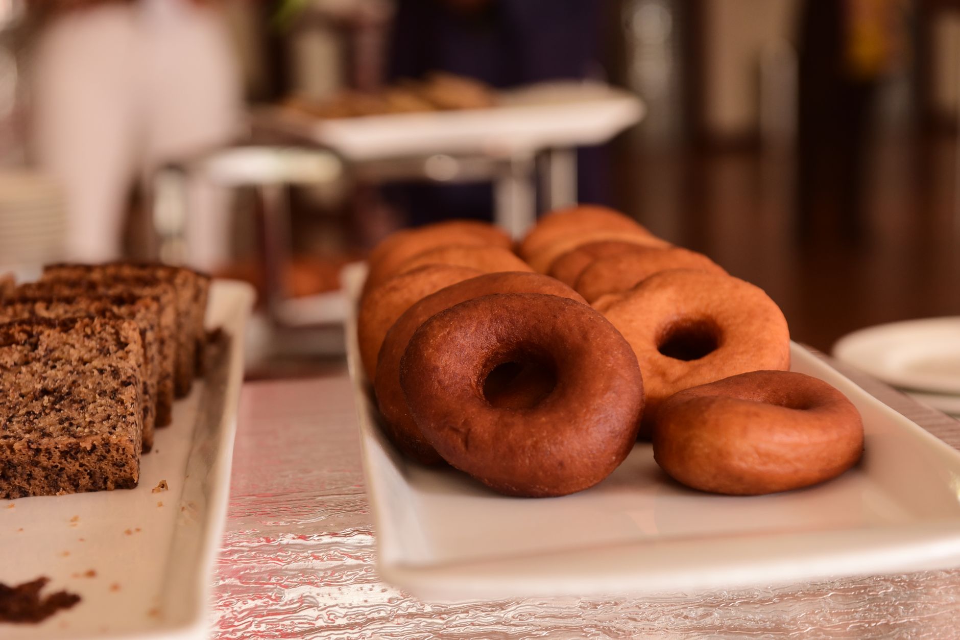 Soft homemade donuts artfully plated with glaze