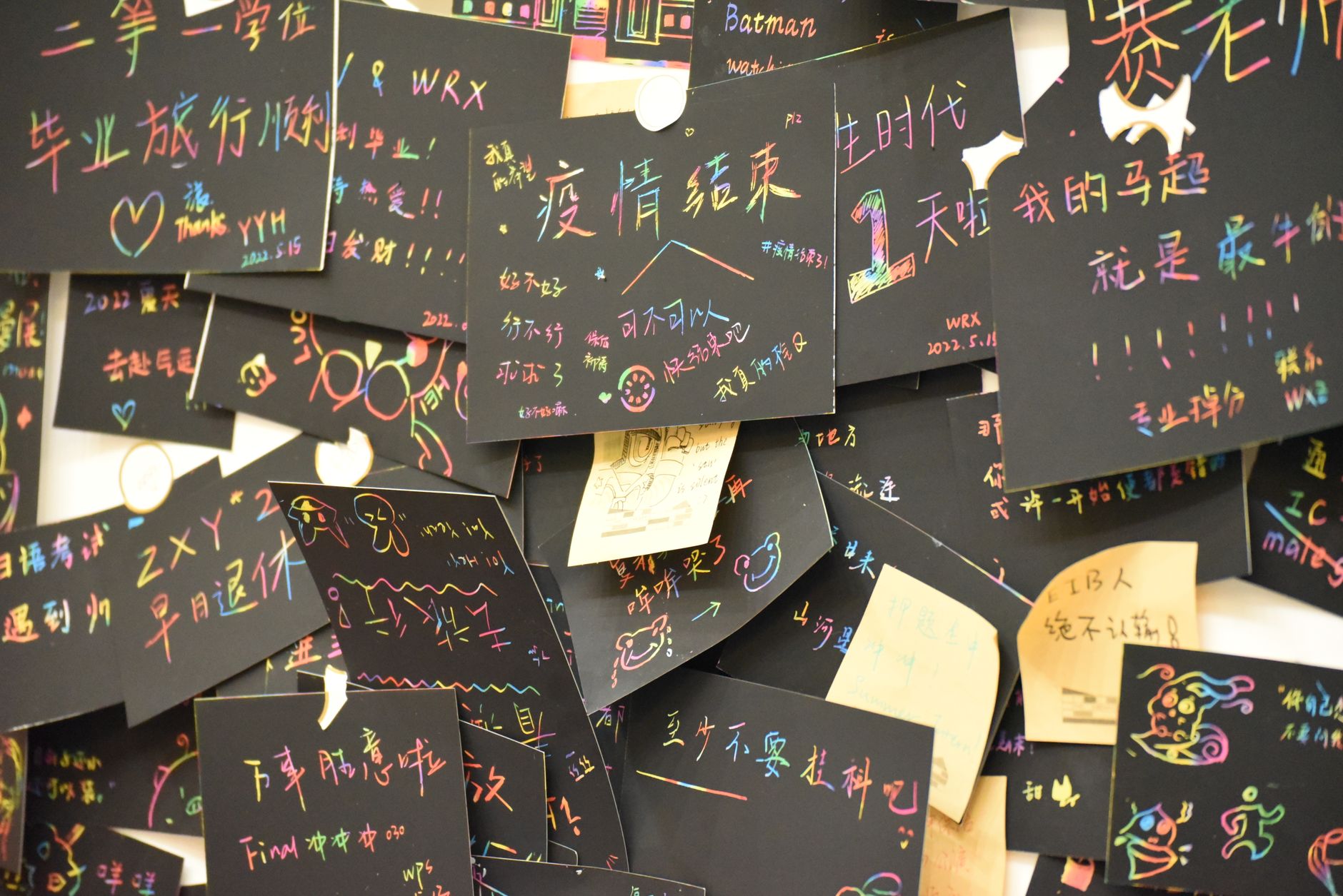 close-up of a handwritten slot testing log beside a smartphone, warm desk lamp