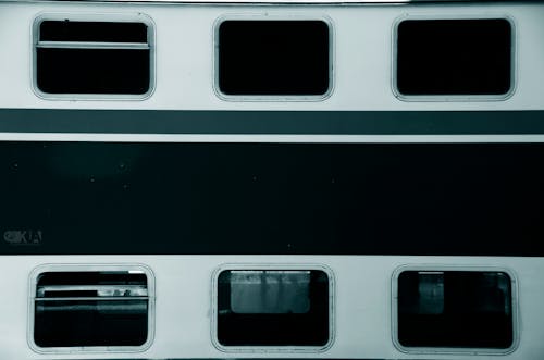 Free White and Black Train in Close Up Photography Stock Photo