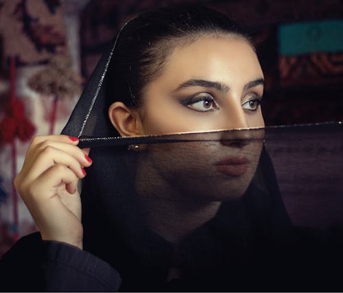 Beautiful Woman Wearing a Black Veil