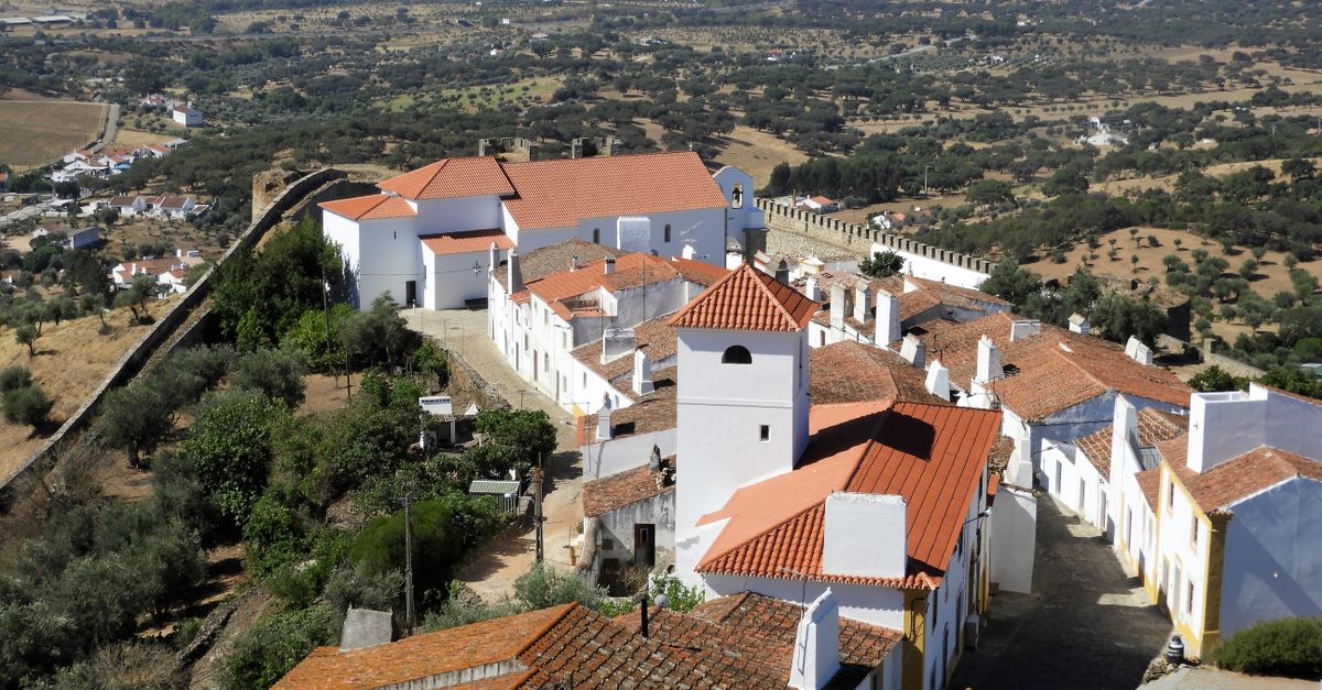 Aerial view of a colorful village on a cliff, Alentejo Portugal