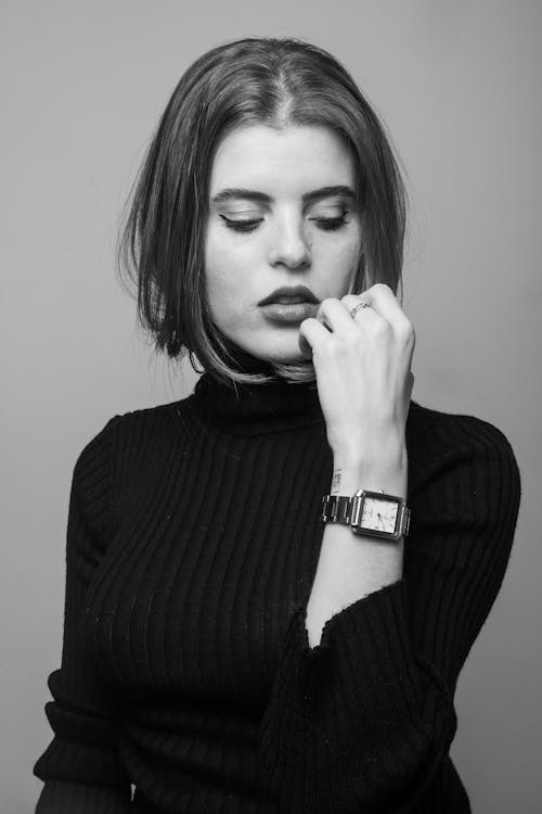 Grayscale Photo of Woman Wearing Watch