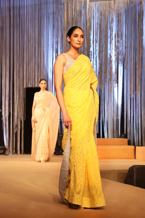 Woman in Yellow Dress Posing on a Catwalk 