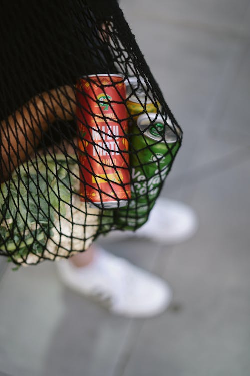 Canned Drinks Inside a Net Bag