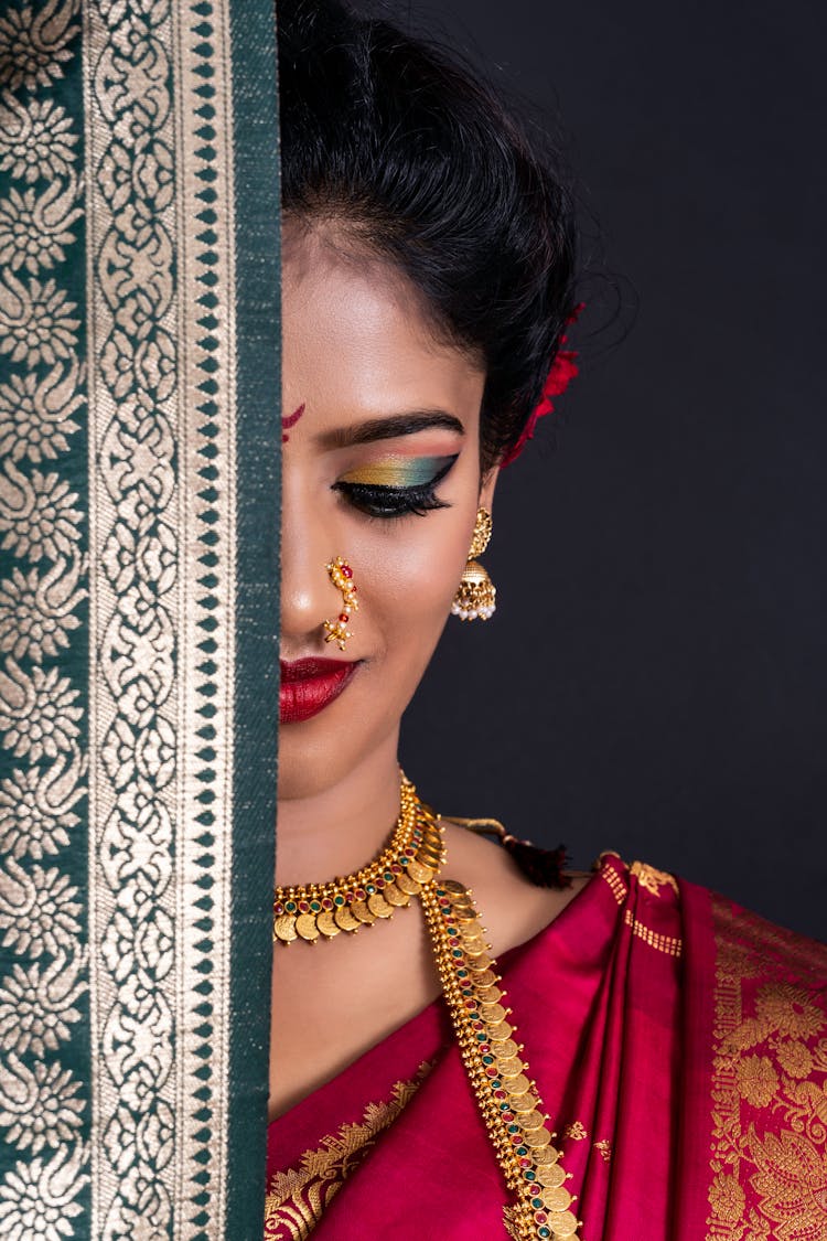 Woman In Red And Gold Sari