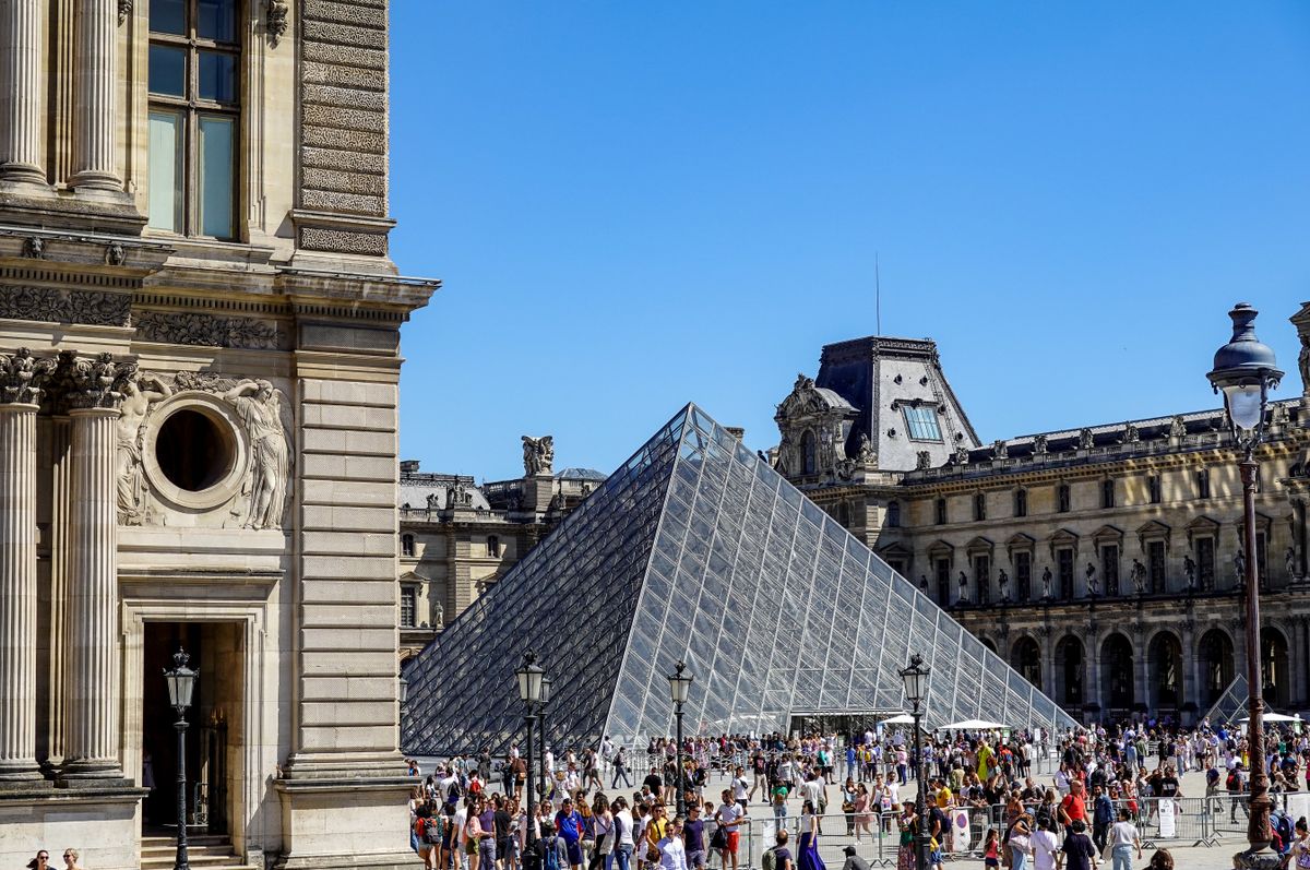 Visitors outside the Louvre Museum in Paris