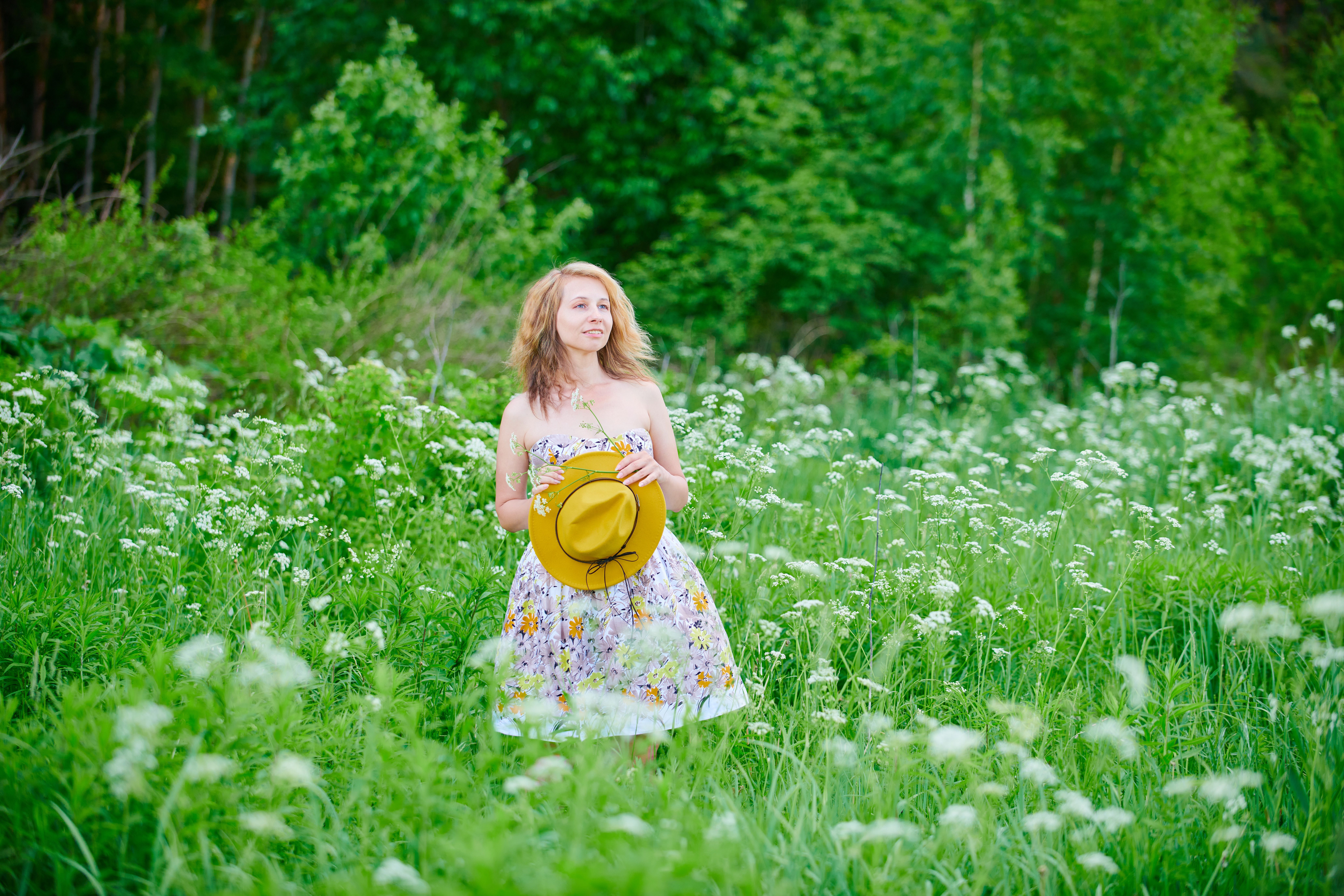 Woman in Floral dress Standing on Flower Field · Free Stock Photo