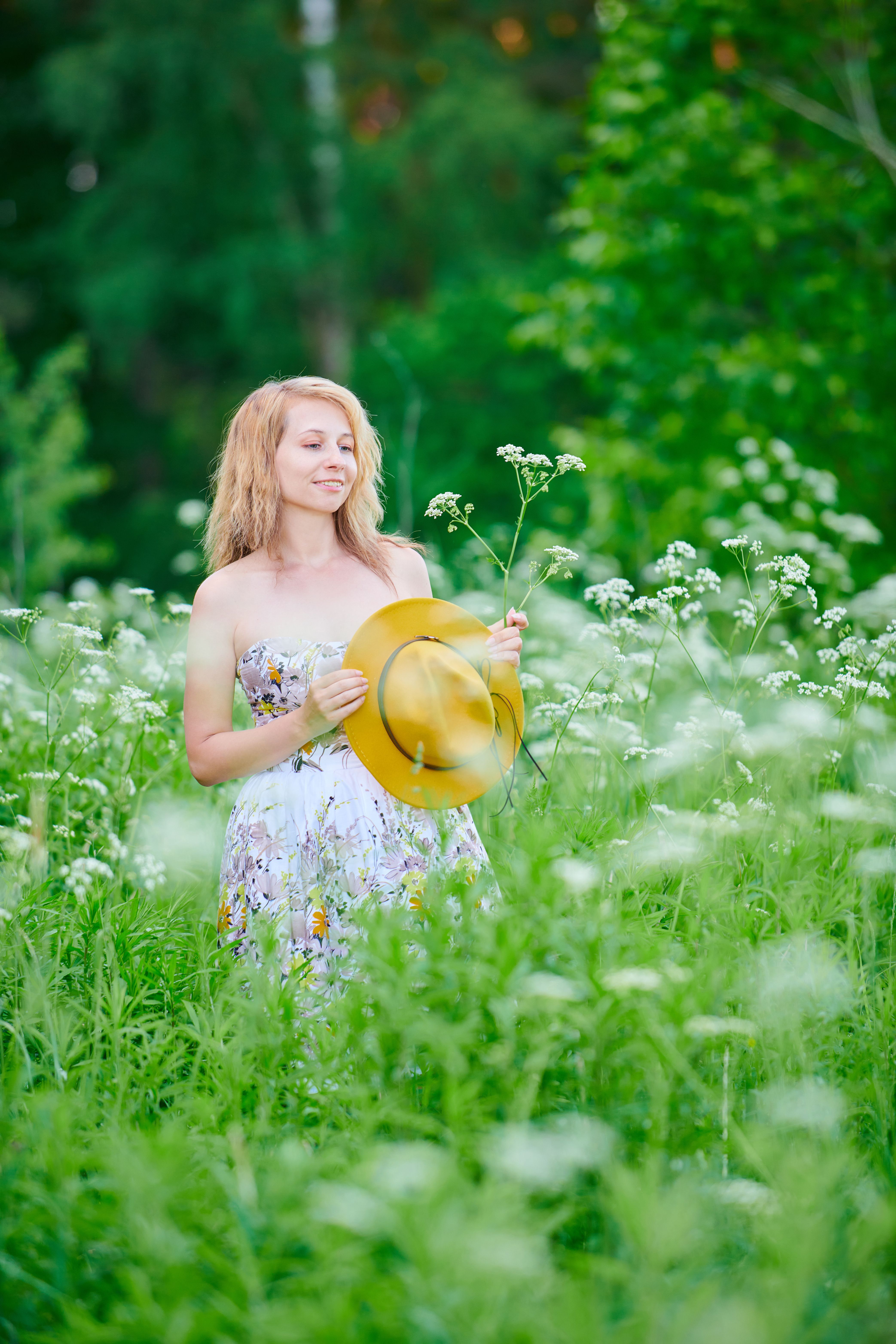 Woman in Floral dress Standing on Flower Field · Free Stock Photo