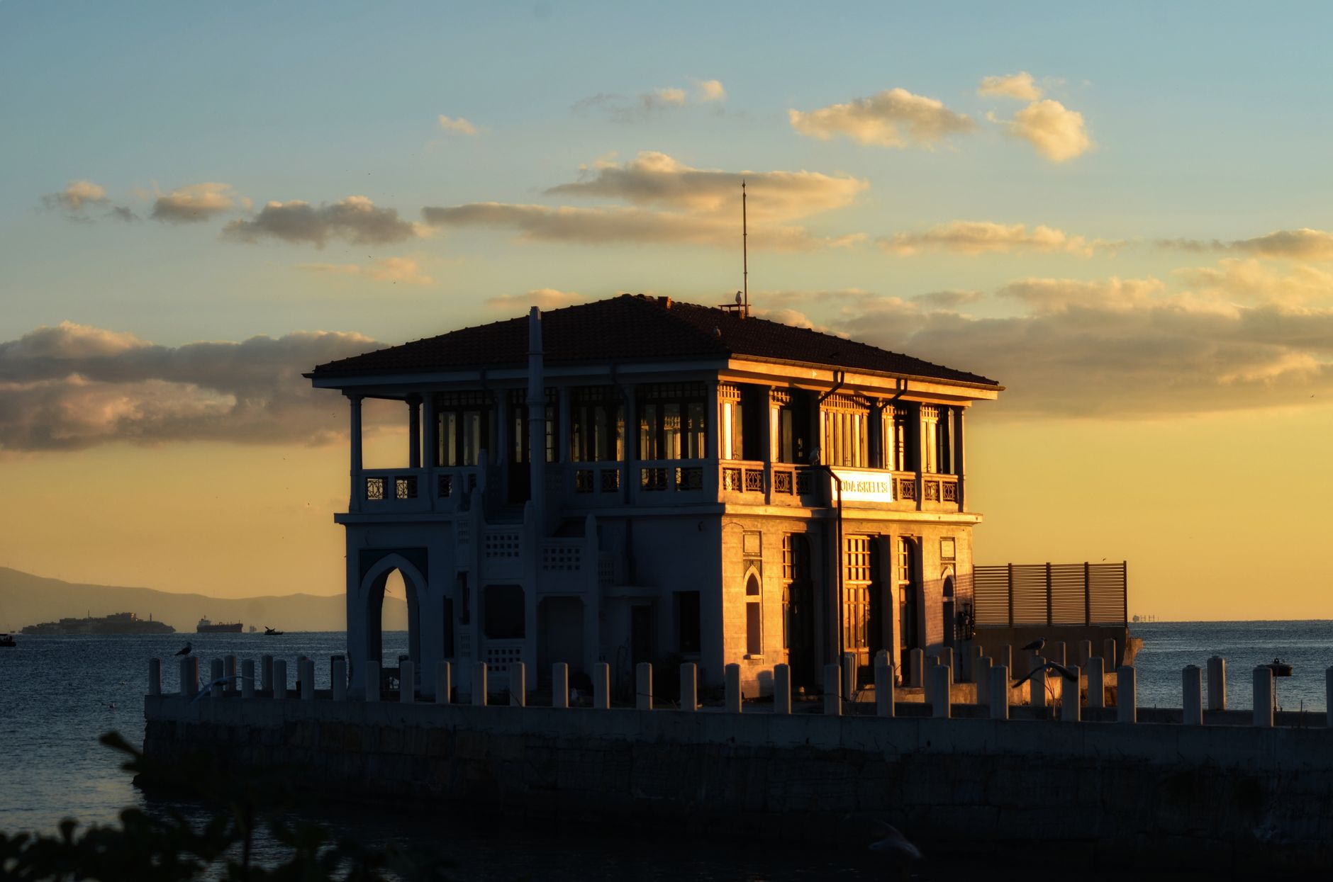 Beautiful view of the Moda Pier in Istanbul during sunset with serene sea surroundings.