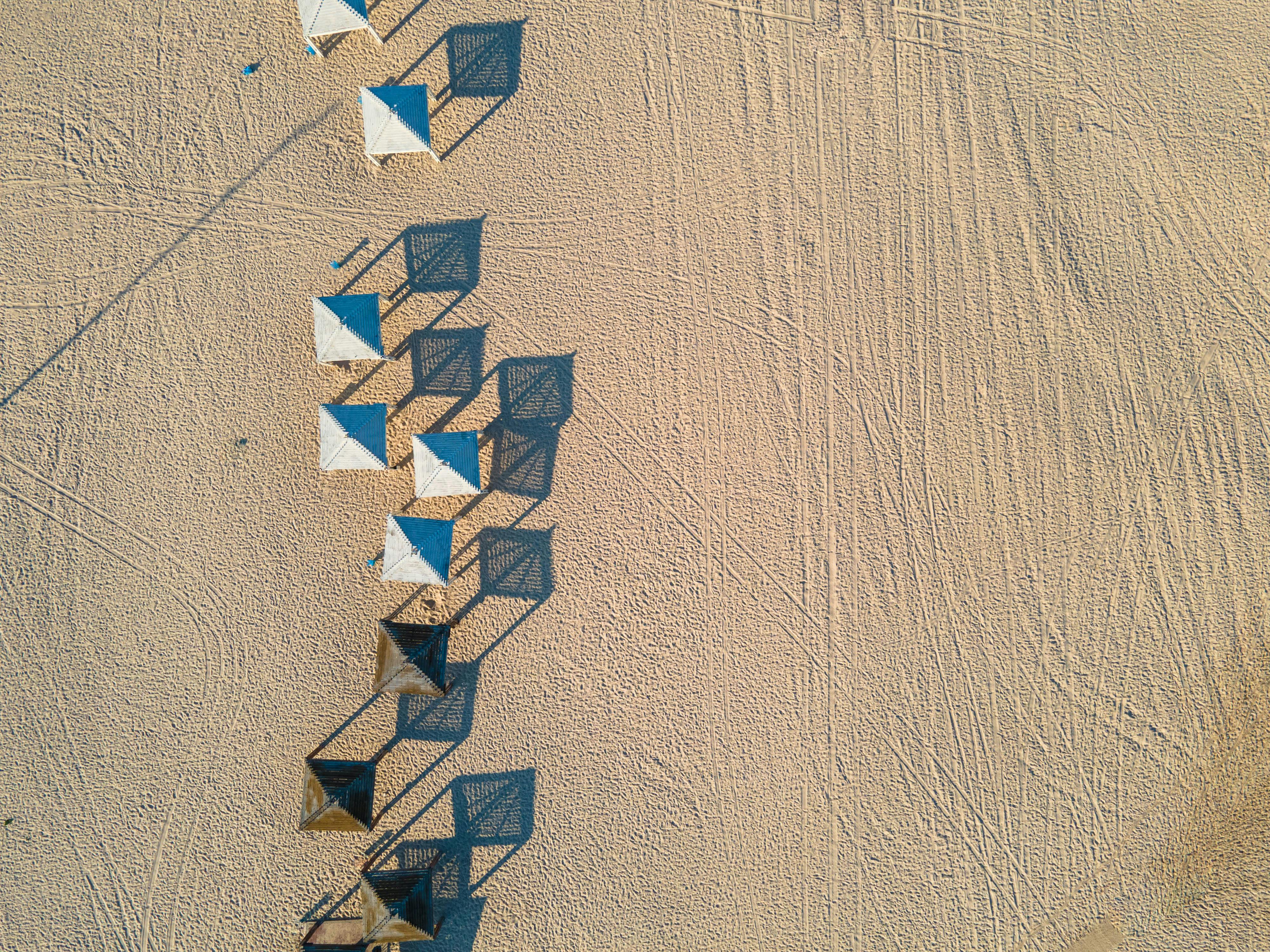 Birds Eye View of Beach Umbrellas · Free Stock Photo